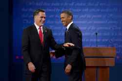 MItt Romney laughing with President Obama
